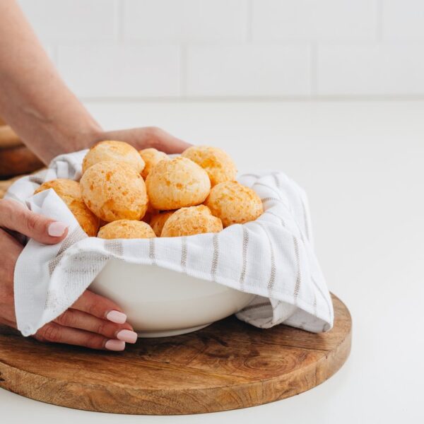 bowl of cheesebuddys in lady's hands